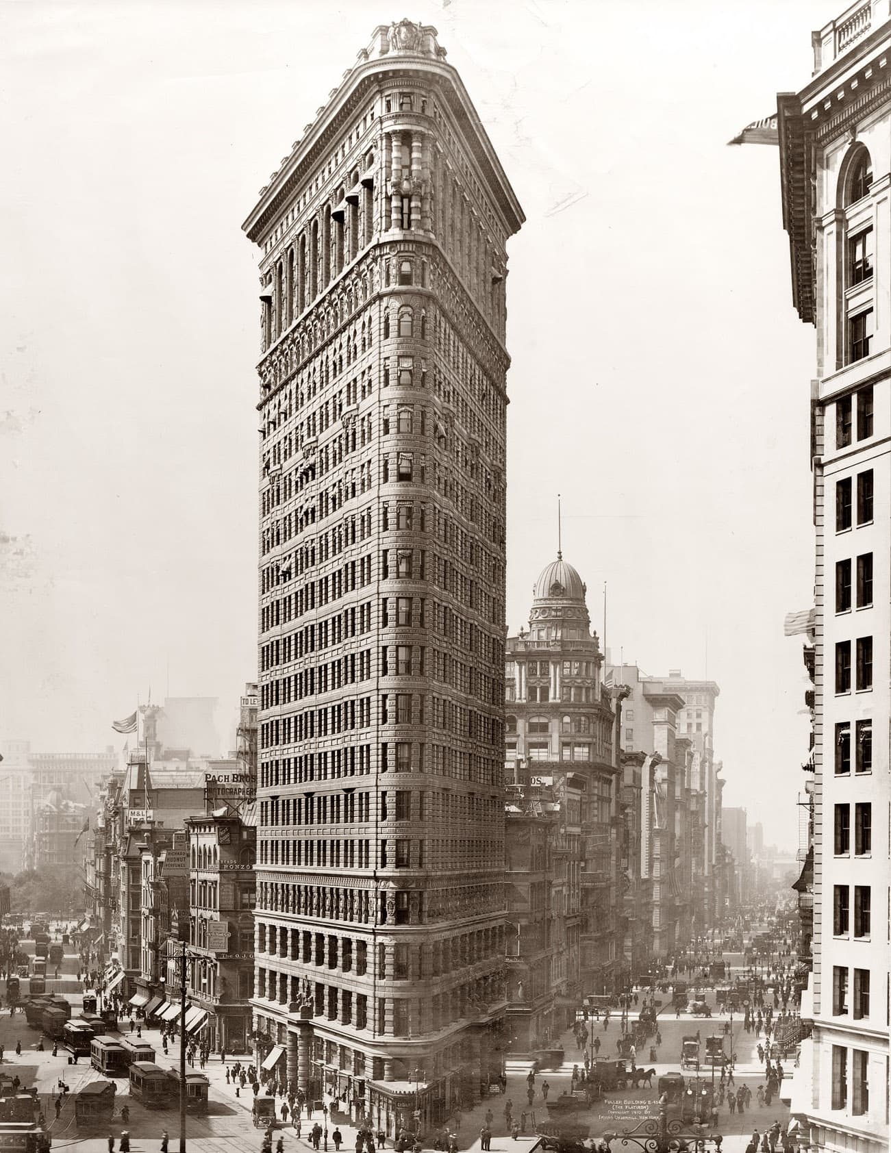 Historic 1910 view of the Flatiron Building at the junction of Broadway and Fifth Avenue